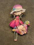 Broche femme, chapeau