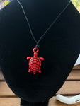 Collier tortue résine