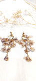 Boucle d’oreille froufrous