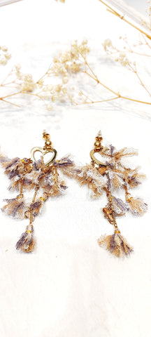 Boucle d’oreille froufrous